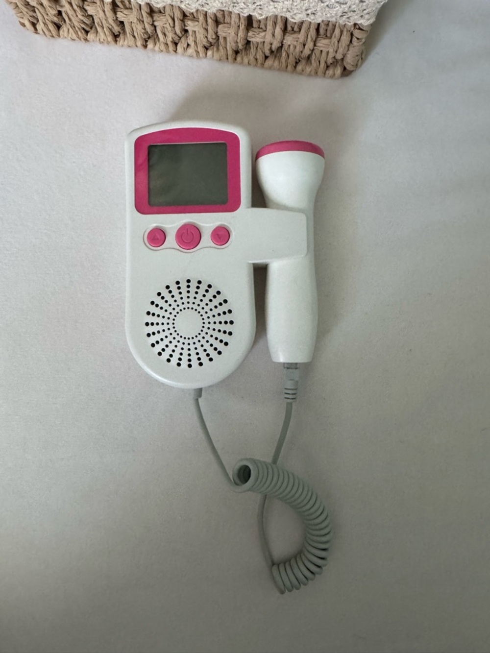 White and Pink Handheld Fetal Doppler - Portable Prenatal Heartbeat Monitoring